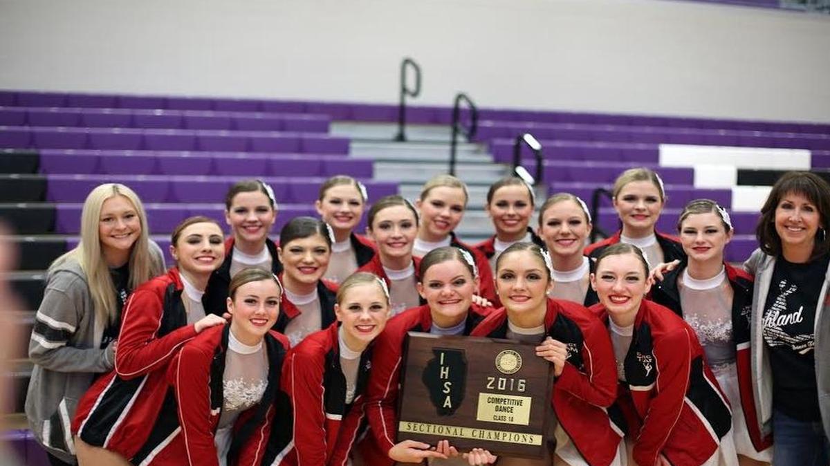 The members of the HHS varsity dance team pose with their plaque after winning the IHSA Mascoutah Sectional on Saturday at Mascoutah High School. The Lady Bulldogs consist of, first row from left to right, Lexy Hagler, Leslie Drueke, McKenzie Rosen, Kelsey Lane, Abigail Rogier; second row, Raven Miranda, Kayla Davis, Ally Becker, Hannah Luitjohan, Olivia Genteman, coach Michelle Deets; third row, coach Emily Wellen, Reagan Thornton, Brooke Wilson, Claire Pabst, Katie Etter and Paige Foster.