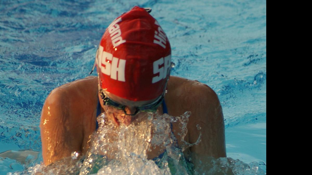 
Highland Splash swimmer Victoria Thomae, 15, won the girls 15-18 100-meter freestyle and 100-meter breaststroke and narrowly finished second in the 50-meter butterfly against the visting O’Fallon Breakers on Tuesday of last week at the Highland Community Pool.
