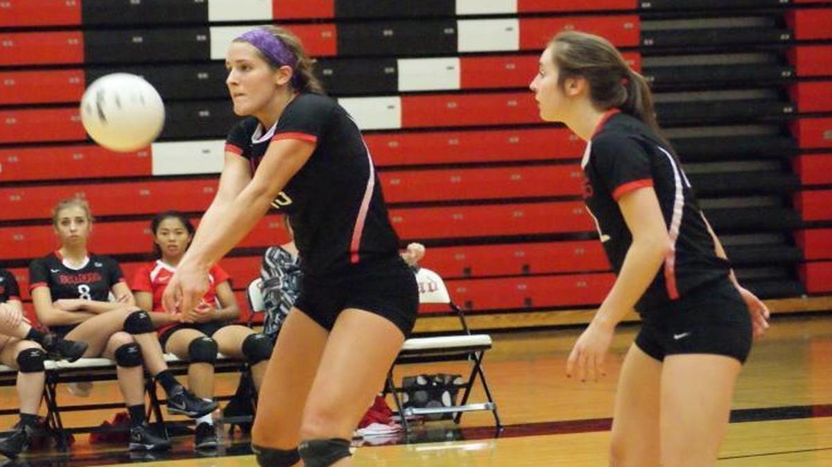 
Highland junior Alex LaPorta bumps the ball up as junior teammate Madison Wellen looks on during the Lady Bulldogs’ 25-8, 25-22 victory at Triad on Tuesday of last week. On Saturday, LaPorta was named to the Highland Bulldog Invitational All-Tournament Team after helping her team go 4-0 and win their own tourney for the first time. 
