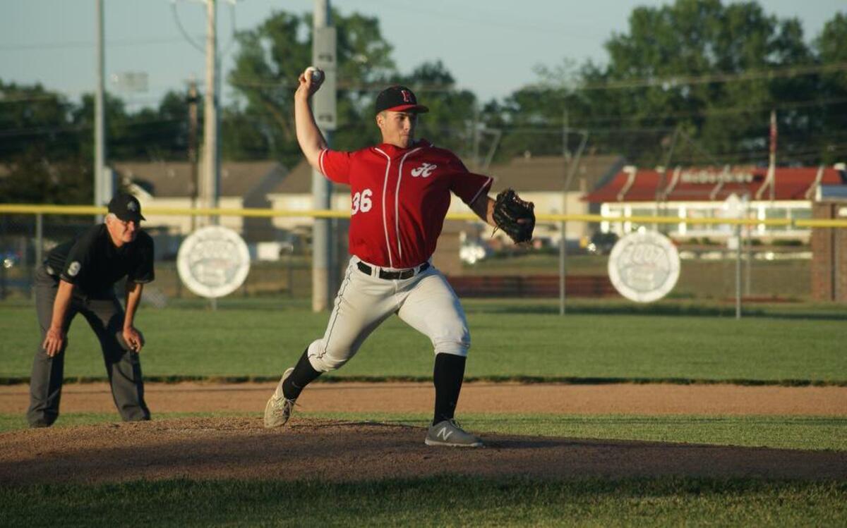 Highland Post 439’s Elliott Prott pitches early during a 2-0 loss to visiting Belleville Post 58 Tuesday at Glik Park.