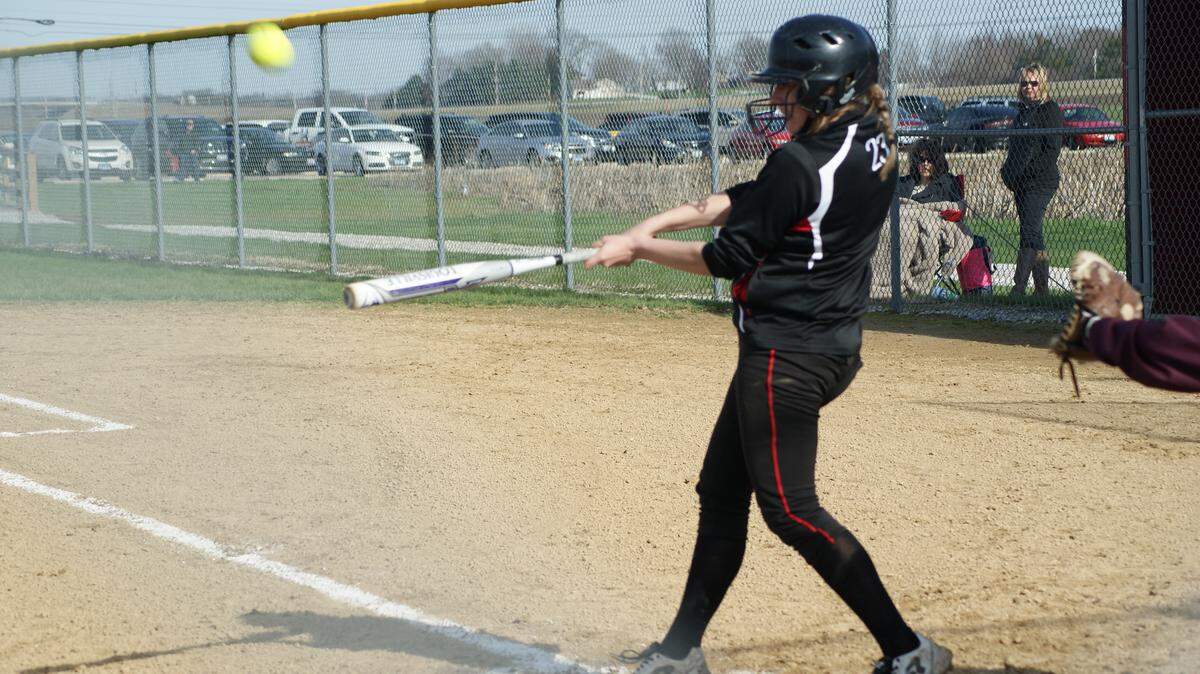 Highland senior Addison Rinderer connects for a triple to lead off a three-run first inning during the Lady Bulldogs' 10-2 mauling of the visiting East Alton-Wood River Oilers Thursday at Highland High School.