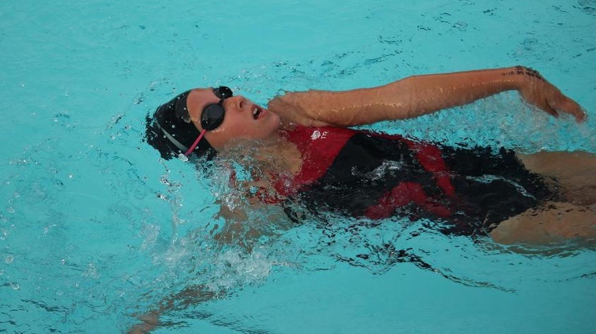 Highland Splash swimmer Anna Henke, a 10-year old swimming the backstroke, won all three of her indiviudal events in the girls 9-10 age division while she also helped the girls 9-10 medley relay team also capture first place in a lightning-shortened meet Thursday at Highland Community Pool.