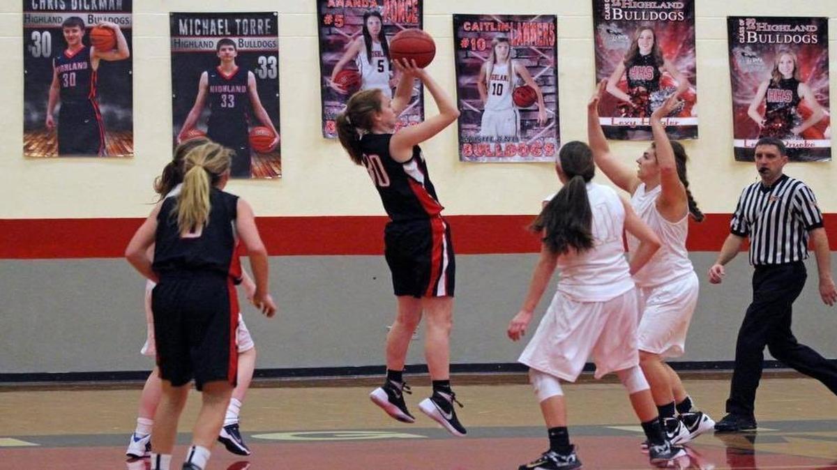 Highland junior Hayley Taylor puts up a baseline jumper during the second half of the Lady Bulldogs’ 52-40 win over Althoff Saturday in the fifth-place game of the 30 th annual Highland Girls Basketball Tournament.
