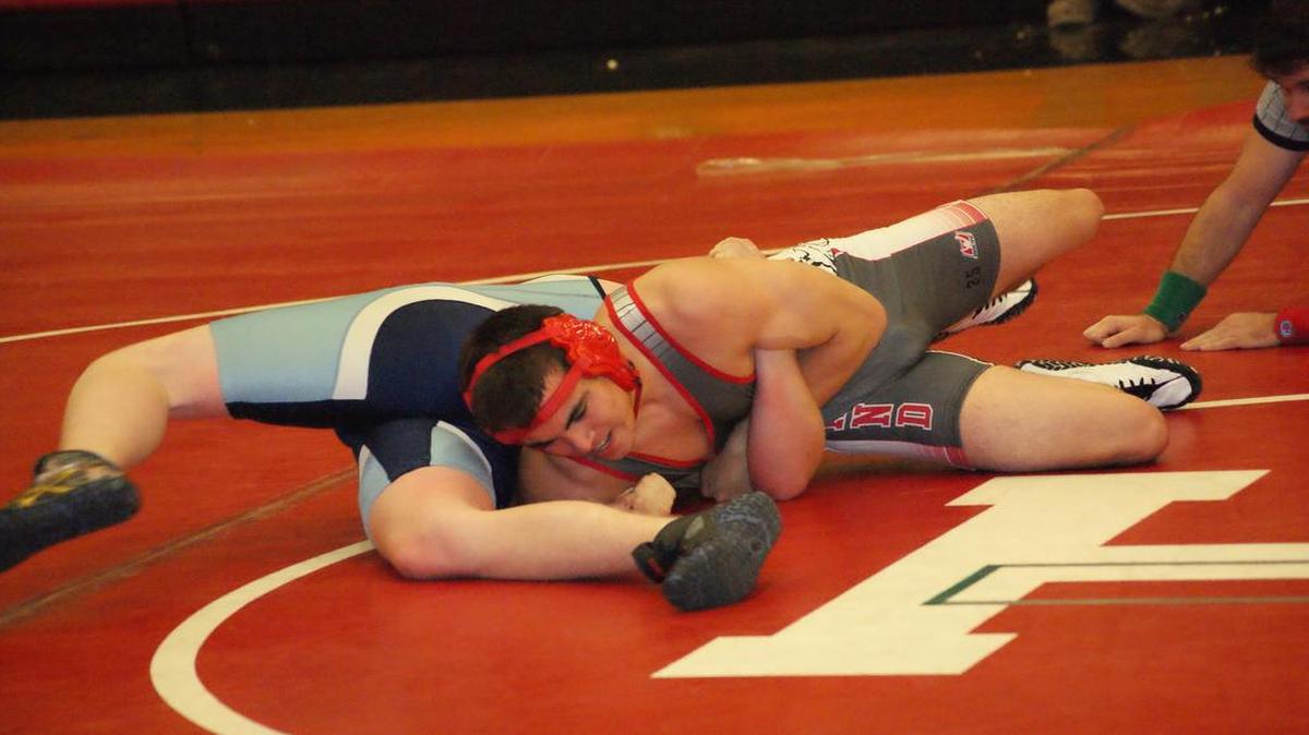 Highland senior wrestler Bordy Kirsch, who is shown dominating Pinckneyville’s Peyton Emling on Nov. 24, won the individual title at 170 pounds on Saturday at the 37 th annual Civic Memorial Holiday Wrestling Tournament.
