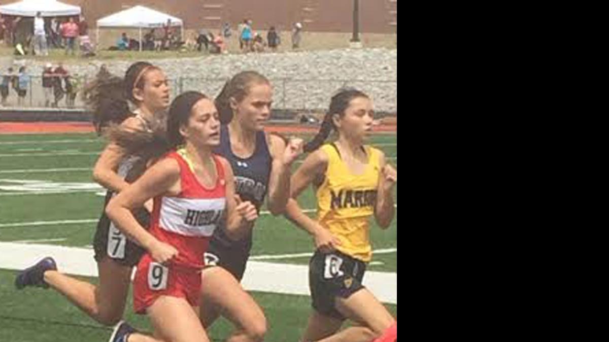 
Highland Middle School’s Katelyn Marti competes in the 800-meter run en route to taking second in the event with a new school-record time of 2:26.71 Saturday at the SIJHSAAA Class L State Track and Field Championships in Carterville. She also arned the fourth-place state medal in the long jump.

