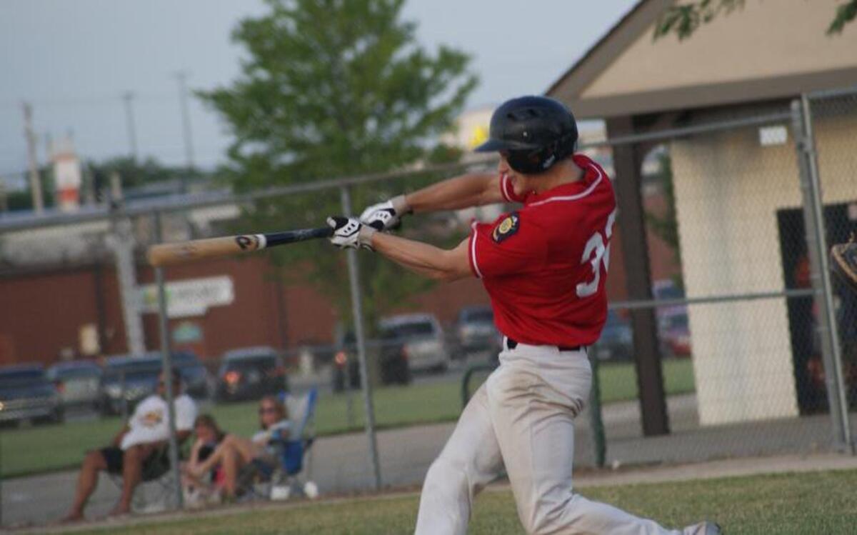 Highland’s Jimmie Smith connects for an RBI single in the first inning of Post 439’s 8-3 victory over visiting Freeburg/Smithton Wednesday night at Glik Park.