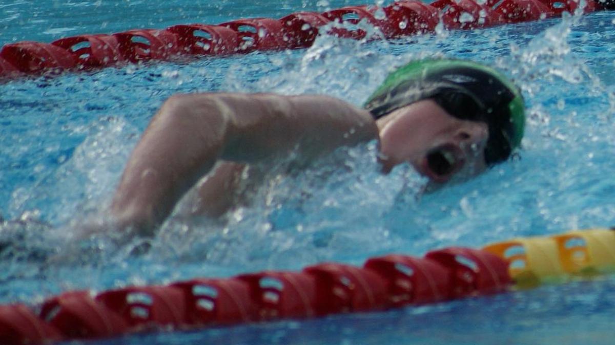 
Highland Splash swimmer Trey Stephens, 13, is shown winning the boys 13-14 100-meter freestyle last thursday evening at the Highland Community Pool. Stephens also was victorious in the 100 breaststroke and the 50 butterfly to help the Splash dominate the visiting Scott Air Force Bzse Sharks, 447 to 69, in their season opener.
