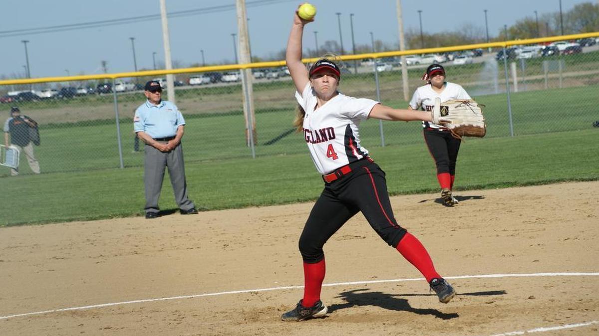 Highland sophomore Kirsten Plocher twirls a pitch as junior second baseman Peyton Holzinger looks on during the Lady Bulldogs’ 4-1 victory over visiting Mascoutah on Wednesday of last week. Plocher went on to earn a 12-3 win at Civic Memorial on Monday to raise her perfect record to 4-0 on the season.