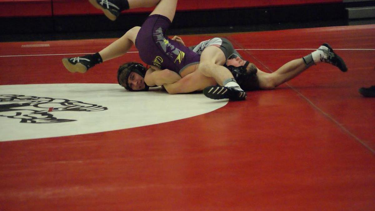 Highland junior Colton Brown scores a nearfall over Carlyle’s Mason Lucas before pinning him at the 3:04 mark of their 126-pound match at HHS on Monday, Jan. 22. Brown went on to finish first at the Mississippi Valley Conference Super Duals Saturday at Jerseyville.