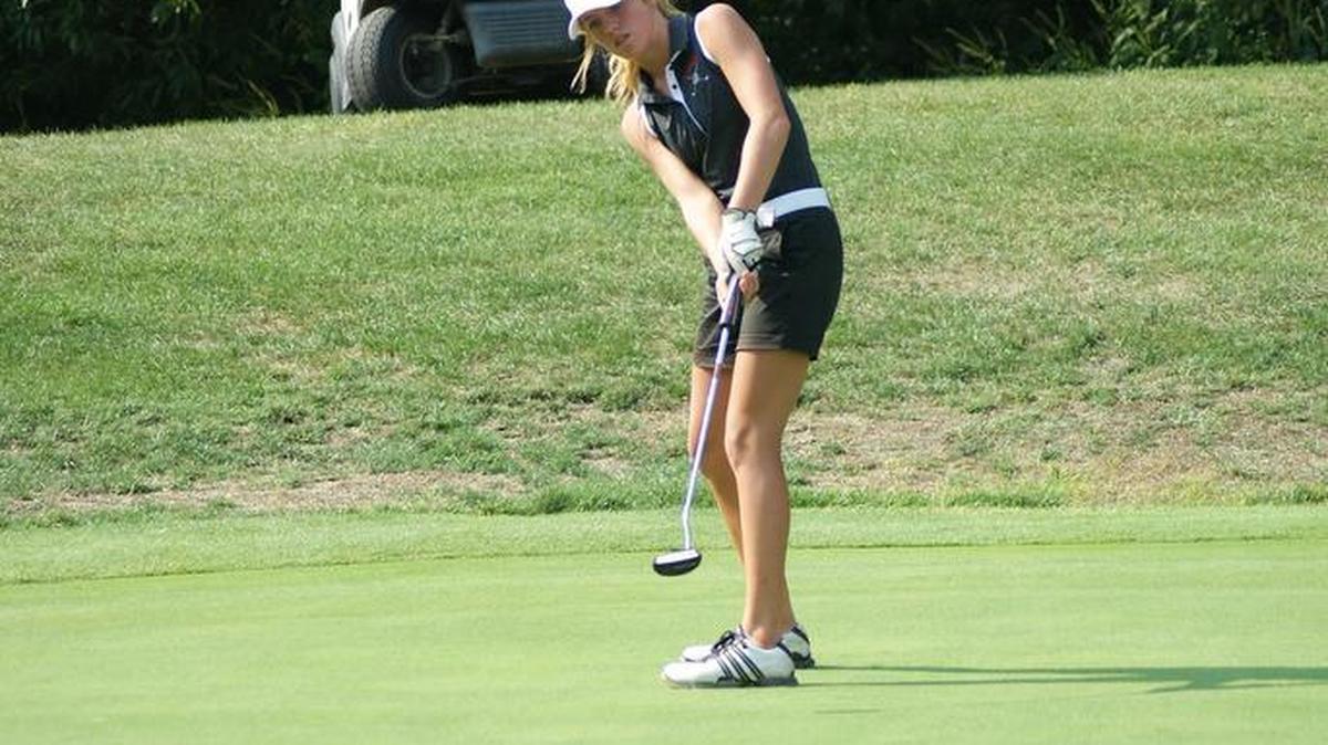 
Highland sophomore Rece Portell shoots a putt on the first hole in a dual match against O’Fallon Monday at the Highland Country Club. Portell carded a personal-best and team season-low round of 43.
