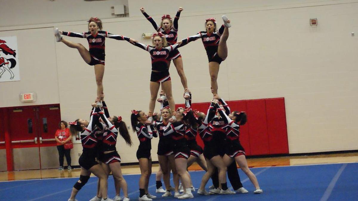 The Highland High School cheerleaders are shown performing a mount en route to winning the IHSA Triad Competitive Cheerleading Sectional Jan. 30 at Triad High School.