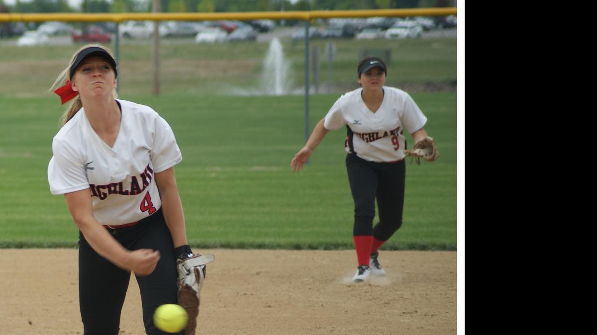 
Highland freshman Kirsten Ploche is shown delivering a pitch with sophomore second baseman Peyton Holzinger in the background. Plocher and her defense helped stifle the Jerseyville Panthers 14-1 in the Lady Bulldogs’ 14-1 five-inning rout Monday in the semifinals of the Class 3A Civic Memorial Regional. 
