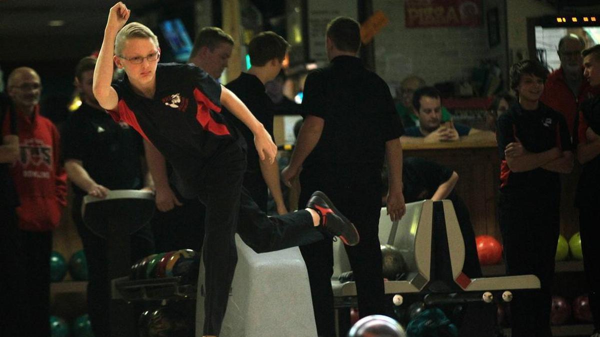 Highland sophomore Austin Davis bowled the team’s highest game in the third and decisive game to help the Bulldogs rally for an improbable victory over visiting Roxana Wednesday at Poplar Junction Lanes.