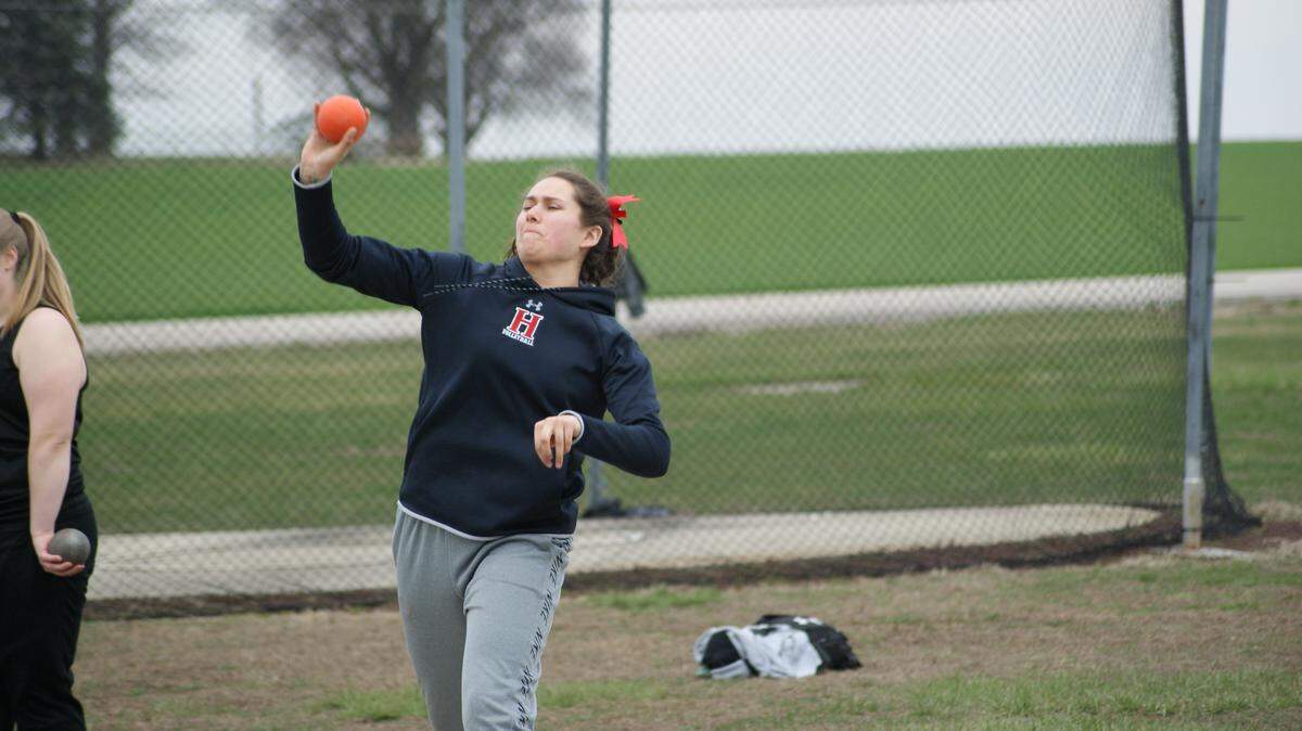Highland freshman Taylor Kesner throws the shot put en route to winning the event with a meet-best distance of 35 feet, 1.5 inches Thursday at a home quadrangular meet at HHS. She also finished second in the discus with a throw of 83-6.