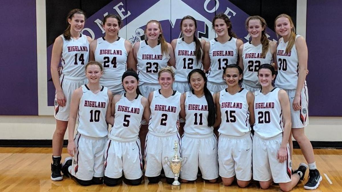 The Highland High School girls basketball team pose with the third-place trophy they earned with a 60-33 victory over Okawville Saturday night at the 40th annual Mascoutah Invitational Girls Basketball Tournament. The Lady Bulldogs consist of, front row from left to right, Kirsten Taylor, Ellie Brown, Rece Portell, Emmy Nyquist, Megan Kronk, Kayla Eads; back row, Madison Clarke, Taylor Kesner, Lauren Baer, Mae Riffel, Bella LaPorta, Ashlyn Klucker and Lexi Taylor.