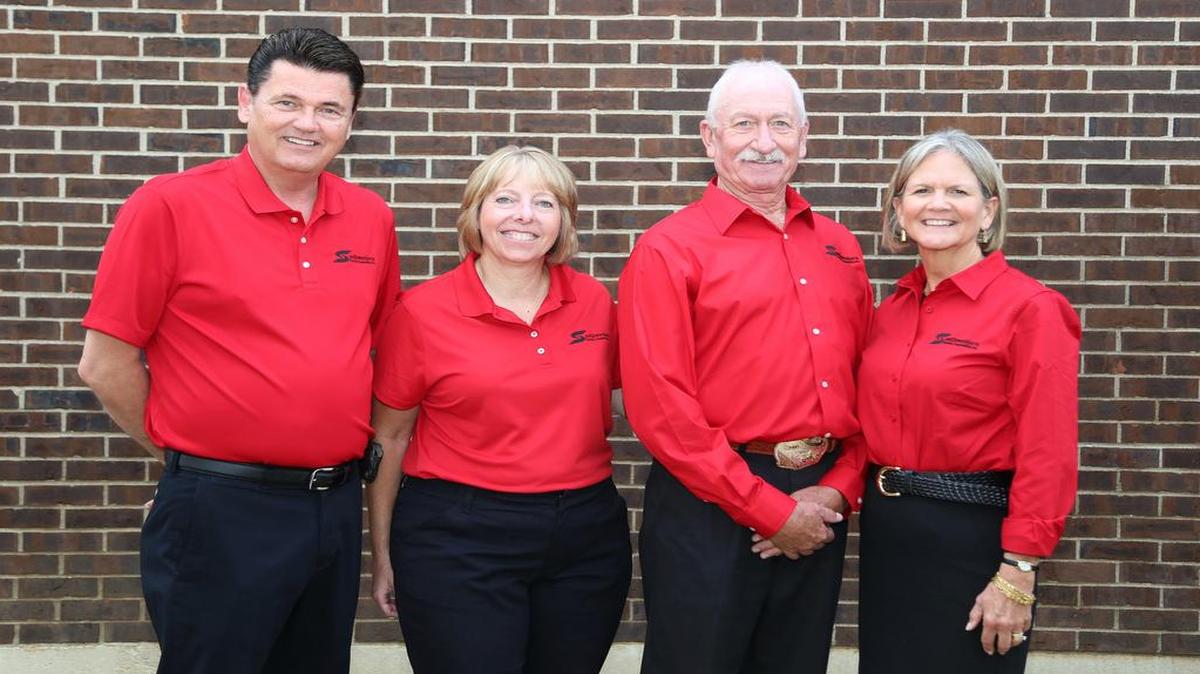 Board members re-elected: Southwestern Electric CEO Kerry Sloan poses with three directors re-elected to the board on Sept. 10 at the co-operative’s annual meeting. From left are Sloan, Sandy Grapperhaus of Collinsville, Ted Willman of Greenville and Ann Schwarm of Loogootee.