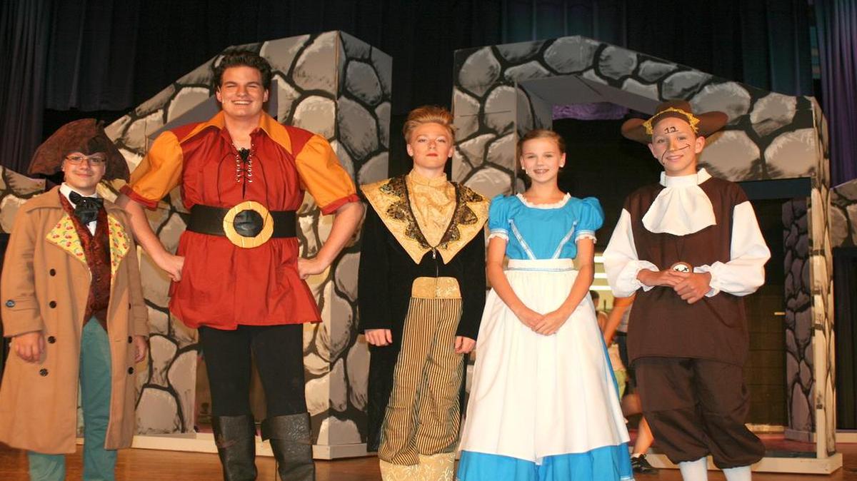 From left are Patrick Boulanger as Lefou, Dietrich Gossmeyer as Gaston, Cole Reed as Lumiere, Katie Schwarz as Belle, and Spencer Powers as Cogsworth as they run through their dress rehearsal practice of Beauty and the Beast, which opens on June 23 at 7 p.m. at the Highland Elementary Auditorium.