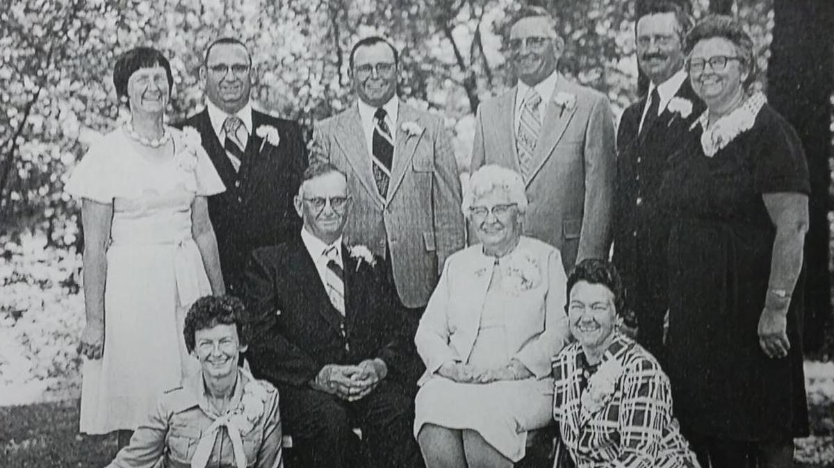 This photo shows the Leo Steiner family. Front row are Carol (Steiner) Suess Bottum, Leo Steiner, Aline (Niggli) Steiner, and Lois (Steiner) Riepshoff; back row, Dori (Steiner) Neumann, Earl Steiner, David Steiner, Vernon Steiner, Alvin Steiner and Margery (Steiner) Wiesemann.