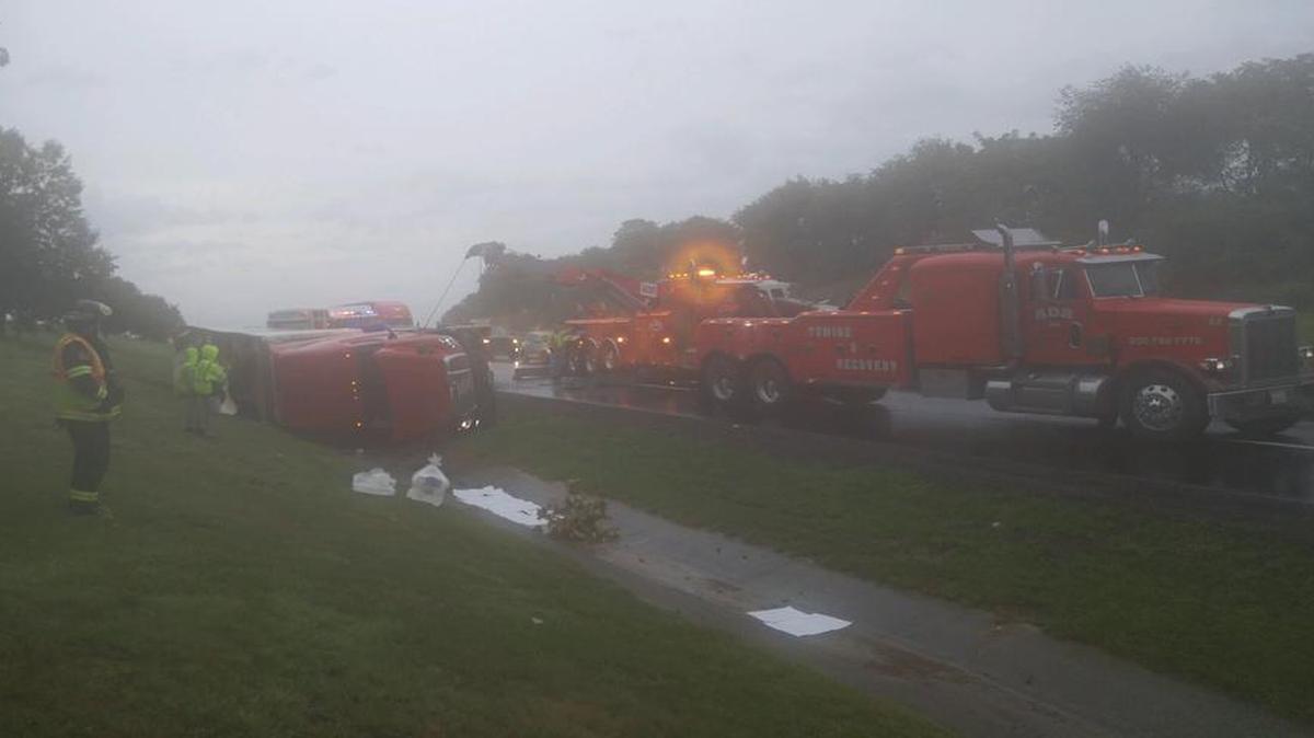 An early morning tractor-trailer accident on westbound Interstate 70 near Highland caused a small chemical spill into Silver Lake Thursday.