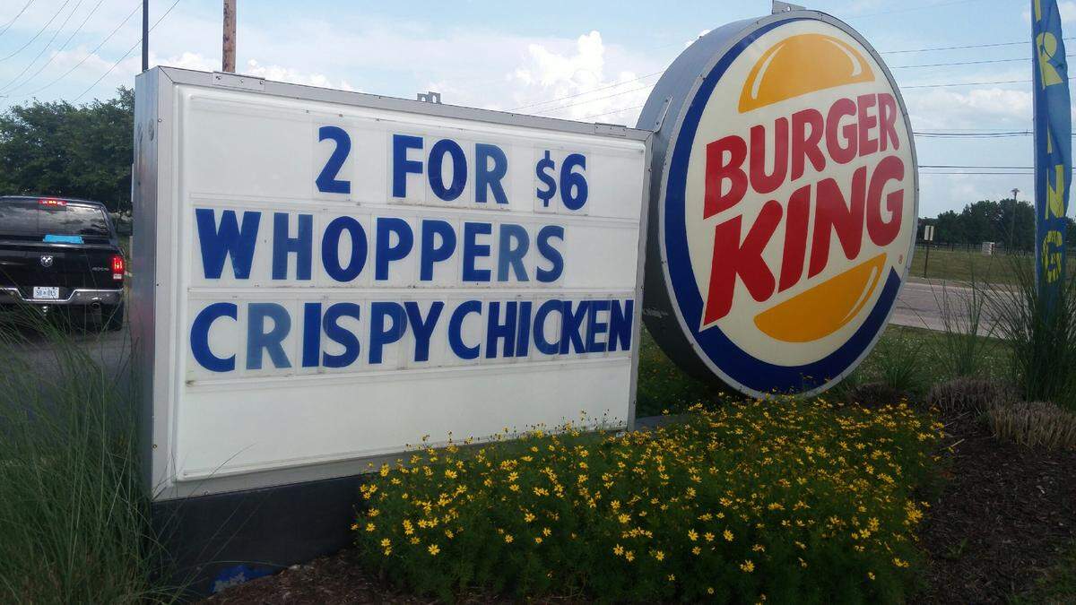 A sign shows some daily fast food specials at a Burger King at 2508 Green Mt. Commons Drive in Belleville, Illinois.