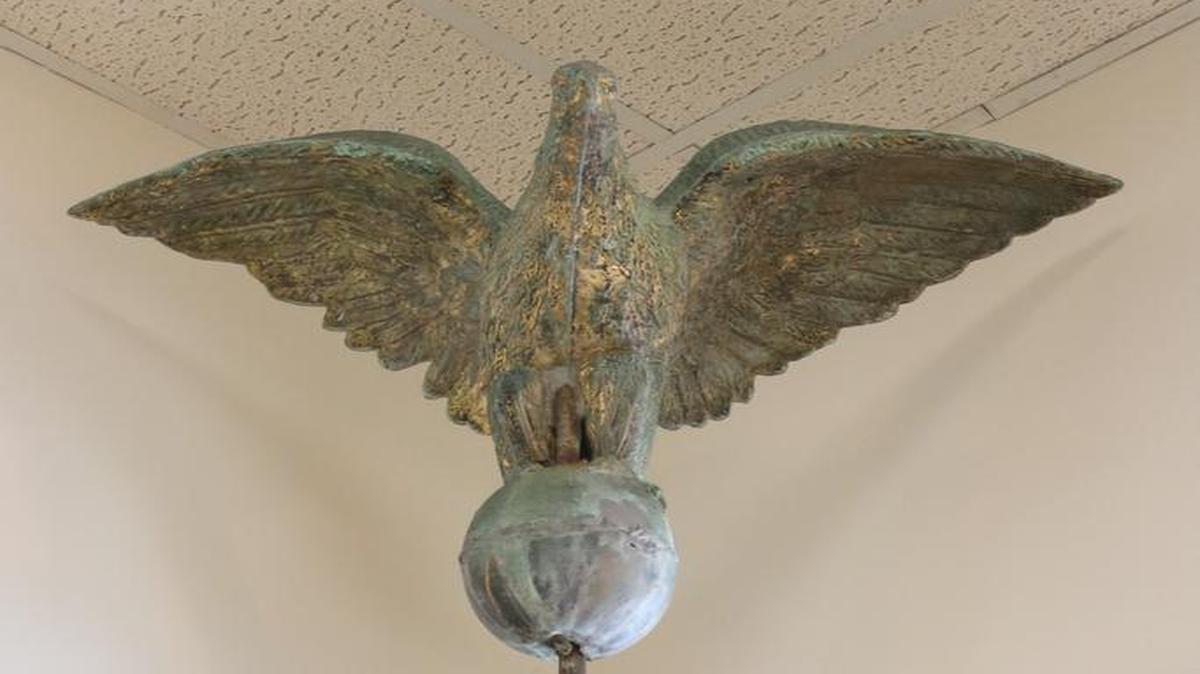 According to Harris, Mr. Rosen once stood on the 30-foot flag pole in the Highland Square and is made of copper. He thinks the eagle dates1937 when the flagpole was raised.