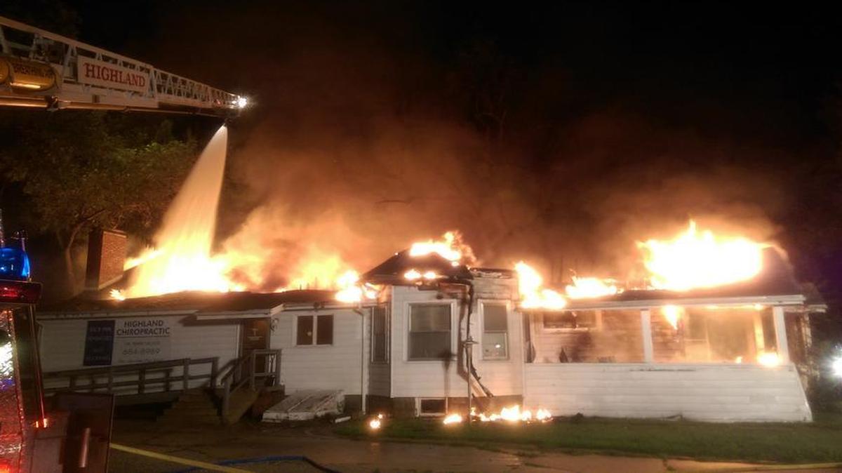 
Firefighters battle a blaze Sunday night at Highland Chiropractic, 206 Walnut St. in Highland. The business was destroyed.

