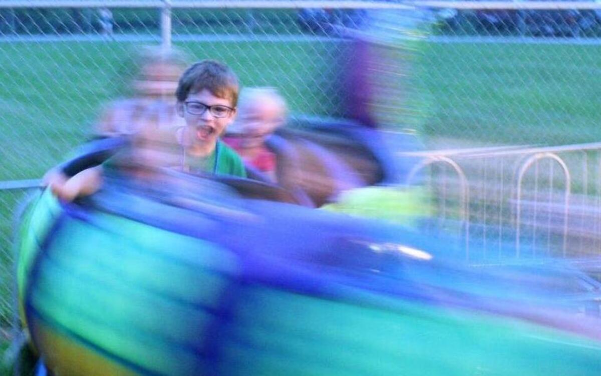 A boy enjoys his ride on the roller coaster last year at the Alhambra Homecoming.