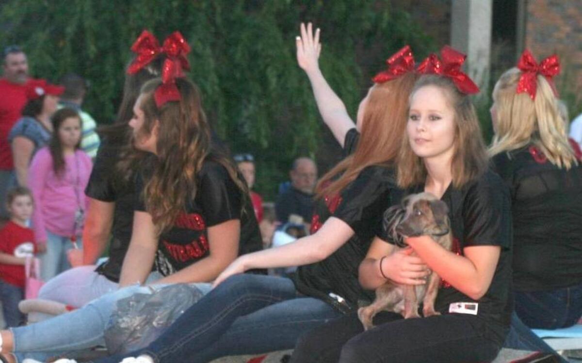 It’s no bulldog, but Leah Sutton took a puppy onto the cheerleaders float in the HHS Homecoming Parade last year.