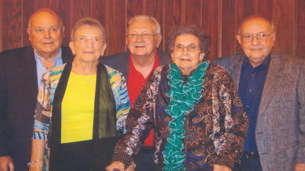 From left, Tom and Sue Tschudy, Ken and Joy Bruckner, and Wayne Antenen pose for a photo at the reunion for the Highland High School class of 1949 held in 2014. Not pictured in Chris Antenen.