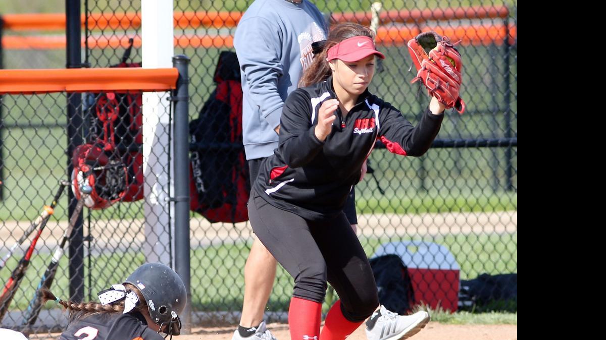 
Waterloo's Emelia Modglin is forced out on a double play at third by Highland's Reily Kassay after a line out caught Modglin off base.
