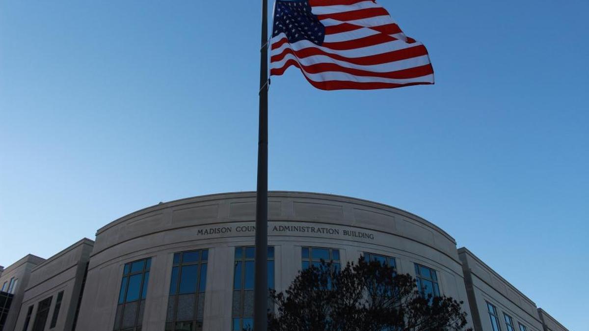 An American flag flies over the Madison County Administration Building in Edwardsville.