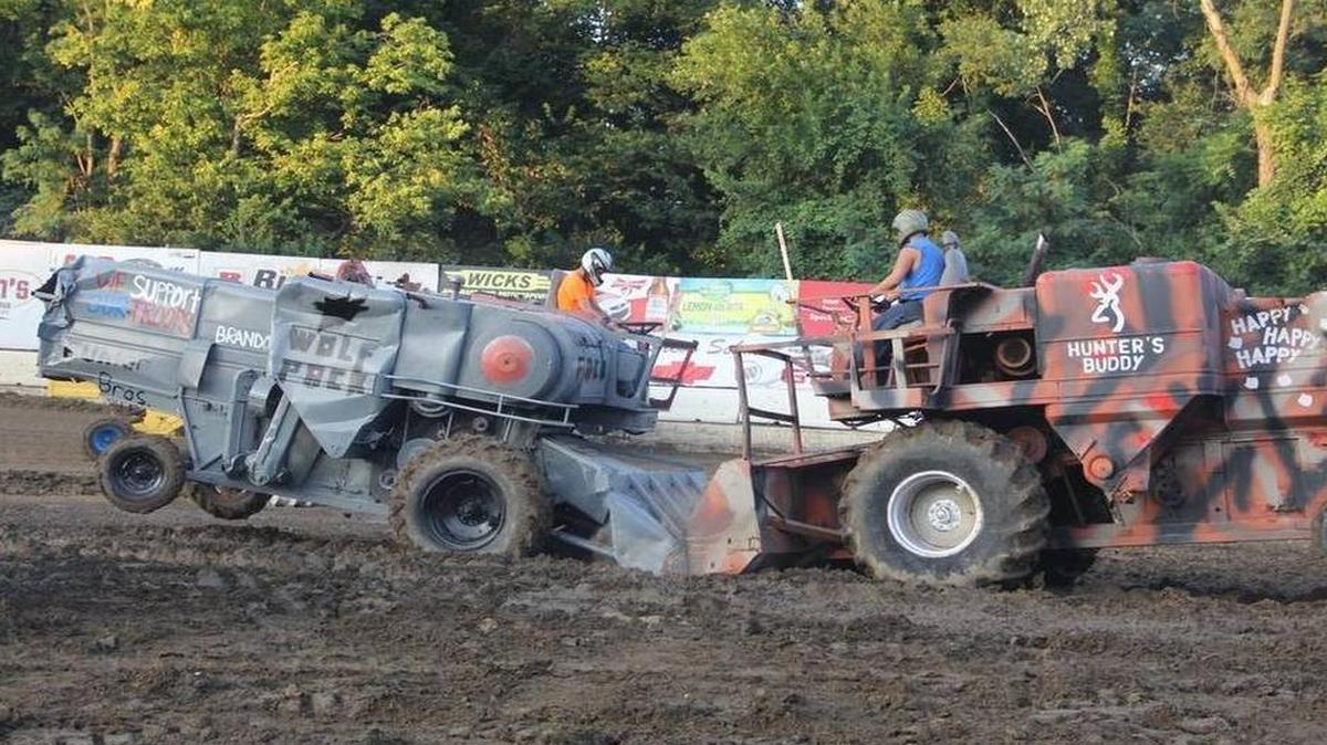 Wolf Pack, driven by Ron Vonderhar of St. Rose, and Hunter’s Buddy, driven by Eric Rinkel of Glen Carbon crash into each other at last year’s Madison County Combine Demolition Derby.