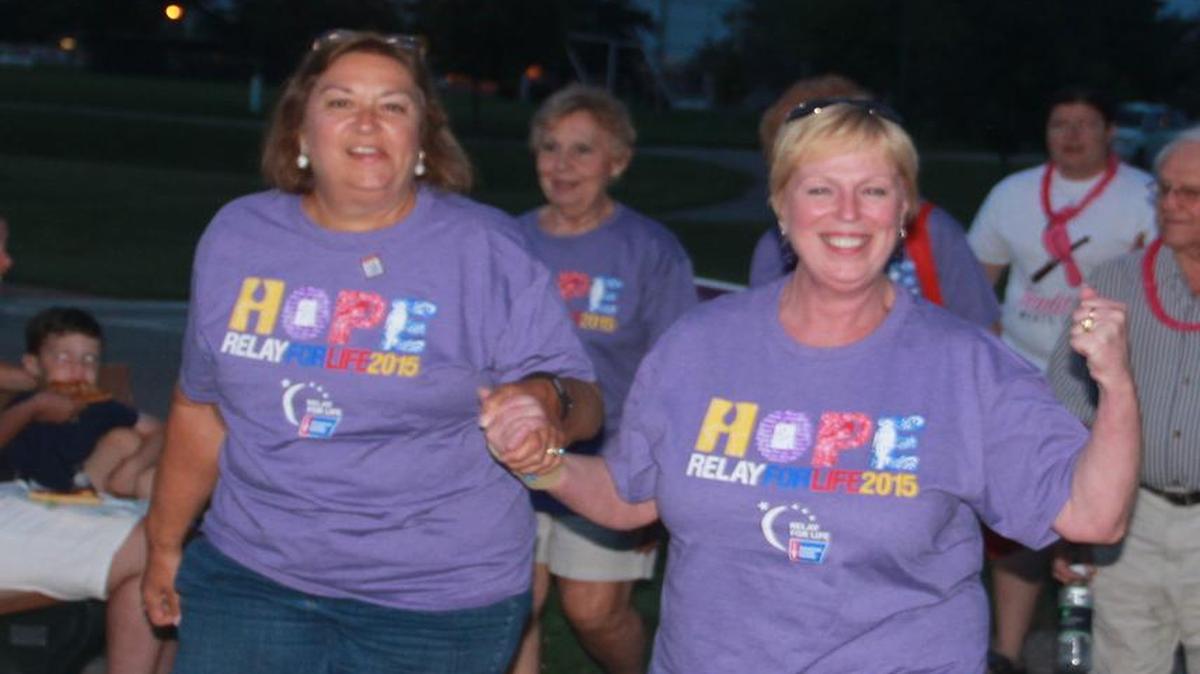 Walkers participate in the Survivor Lap at last year’s Relay for Life in Highland.