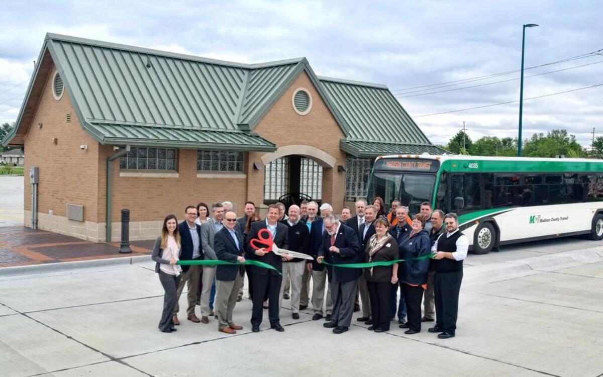 At a brief ceremony this morning, Madison County Transit (MCT) Chairman Dan Corbett was joined by Troy Mayor Al Adomite, MCT Managing Director Jerry Kane and other local officials, staff and trustees to cut a ribbon commemorating the opening of the new MCT Troy park-and-ride facility.