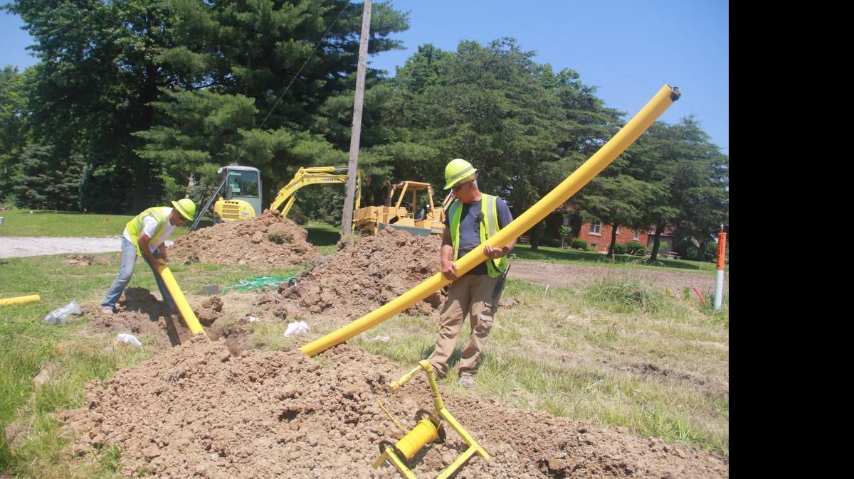 
Kenny Traylor and Brian Keller, Ameren Illinois gas journeymen, place a gas line along Illinois Route 160 on Tuesday afternoon. Construction began on June 1 of approximately three miles of gas distribution main that will extend from Ameren Illinois’ existing gas line along Illinois Route 160 to Grantfork, as well as construction of additional gas mains and services that will run throughout the village. 
