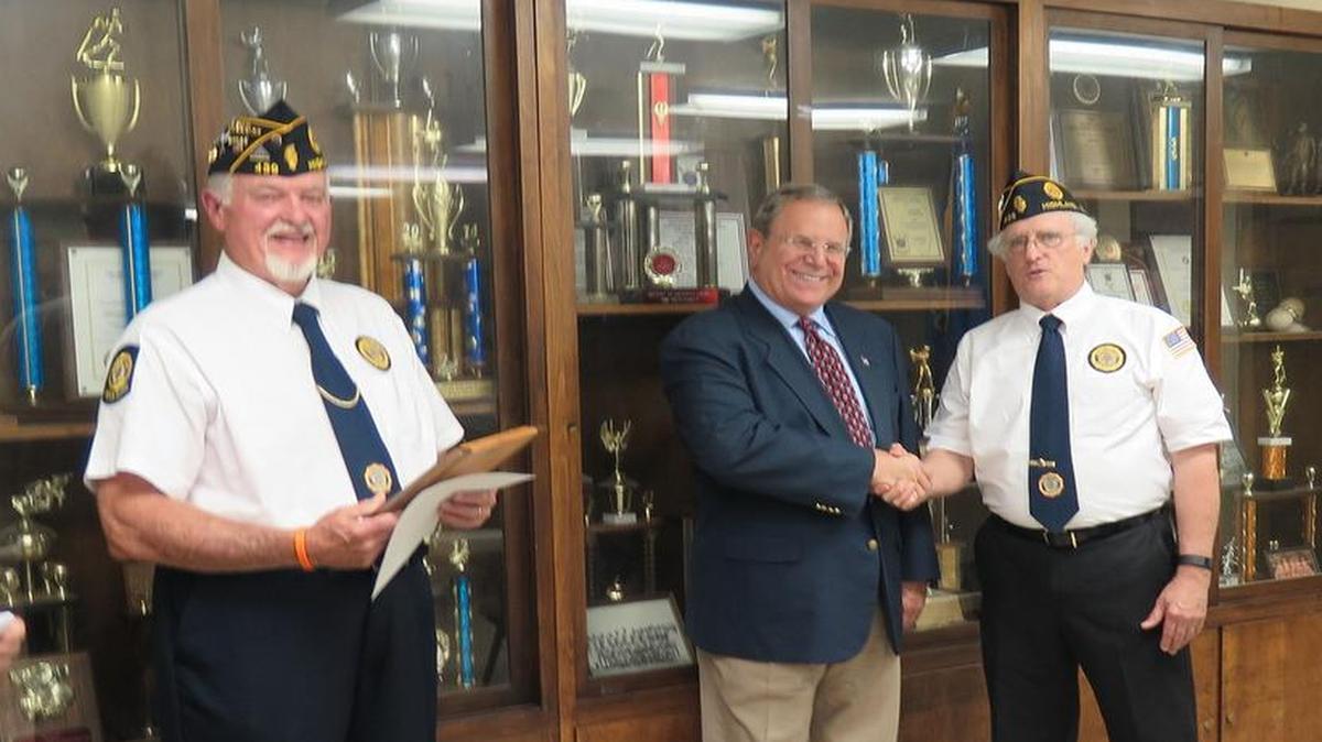 Members of Lee Iten American Legion Post 439 in Highland present Jay Boulanger with an honorary lifetime membership in the post. From left are Val Buchmiller, Bill Halcomb, Boulanger, and Jim Hobbs