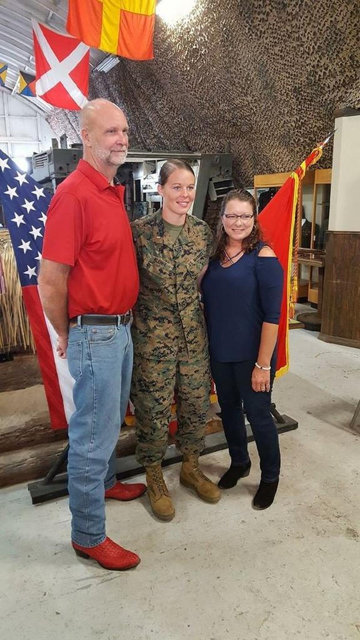 Second Lt. Mariah Klenke, a Breese native and a graduate of Highland High School, stands with her parents, Darrell and Tina Klenke, on Oct. 3 at Camp Pendleton, Calif., where she made military history by becoming the first female Marine to graduate from the Marine Corps Assault Amphibian Officer Course and earn the military occupational specialty of assault amphibian officer.