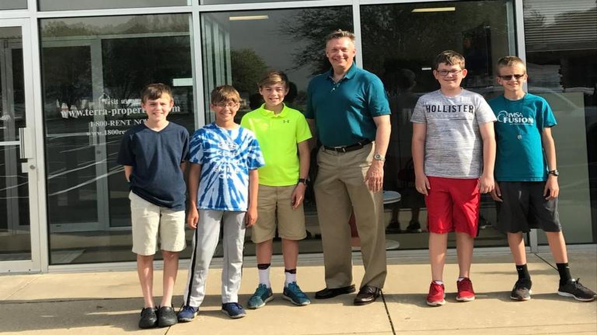 Members of the Highland Robotics Club from left to right, Ethan Smith, Gabe Schwarz, Patrick McGinley, Rob Bowman of Terra Properties, Michael Barry and Issac Irving; team members not pictured are Grant Rednour, Drew Schonhardt.