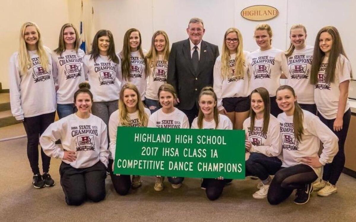 The Highland High School Dance Team was honored during the Highland City Council meeting on May 1 for their outstanding achievements during this year’s dance season and the Illinois Drill Team Association State Competition at the Prairie Capitol Convention Center in Springfield. Pictured are, front row from left to right, Alana Hollenkamp, Hannah Luitjohan, Reagan Thornton, Ally Becker, Kylie McFarland, Alexis Finley; back row, coach Emily Wellen, Olivia Genteman, Kayla Davis, Katie Etter, Abigail Rogier, Mayor Joe Michaelis, Claire Pabst, Paige Foster, Brooke Wilson, Bree Etherton