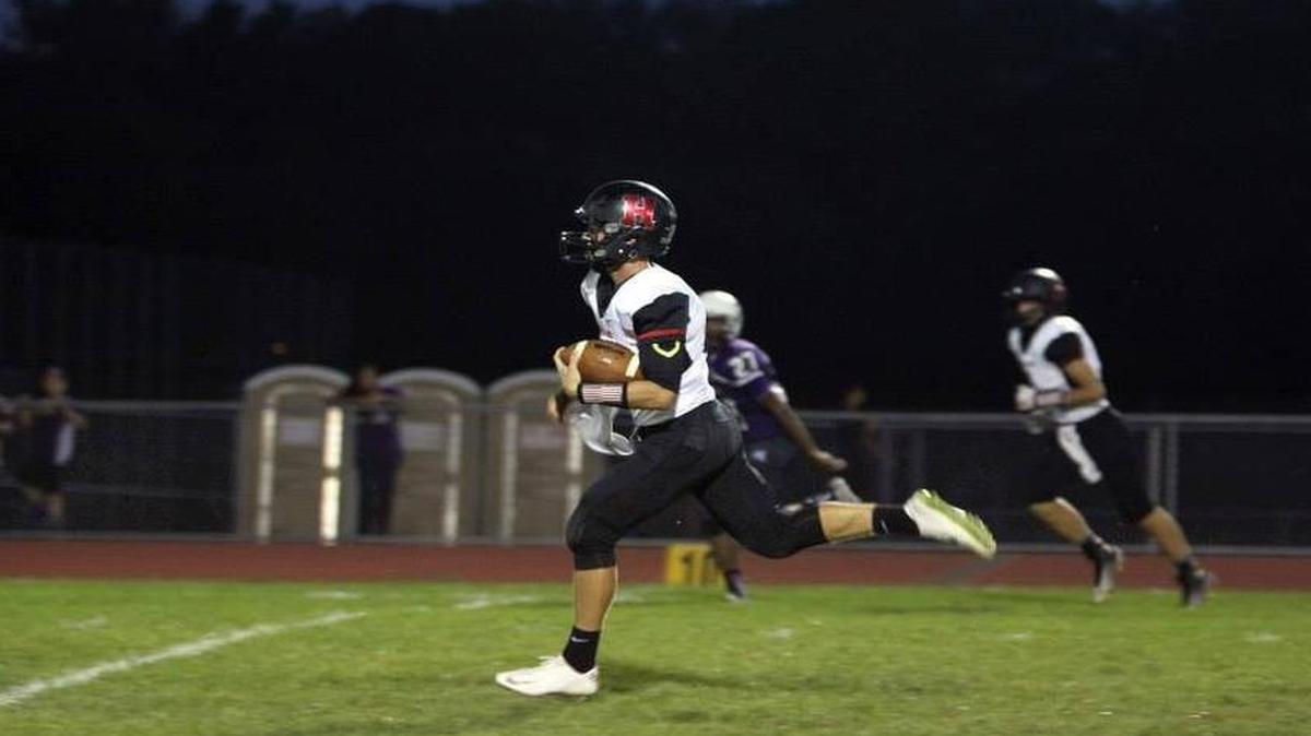 Highland junior quarterback Garrett Marti ran for touchdowns of 18 and 17 yards while he also threw for 252 yards and one score in the Bulldogs’ narrow 25-24 season-opening loss at Cahokia on Friday night.