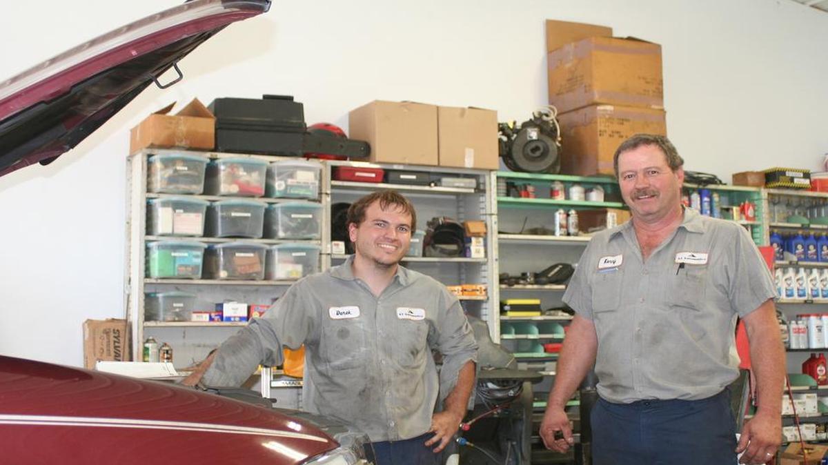 
Derek Bellovich and Kenny Logue stand in Logue’s shop, A1 Automotive on on East Allen Street in New Douglas.
