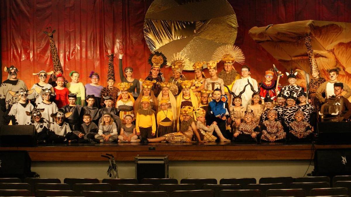 The complete cast of Hard Road Theatre’s presentation of ‘Disney’s The Lion King Jr’ pose for a photo in their costumes prior to a dress rehearsal Monday night at the Highland Elementary School auditorium. Show times are 7 p.m. Thursday, June 22; Friday, June 23; and Saturday, June 24. There will be a 2 p.m. matinee Sunday, June 25. Advance tickets are $9 for students and seniors and $10 for regular adult admission.