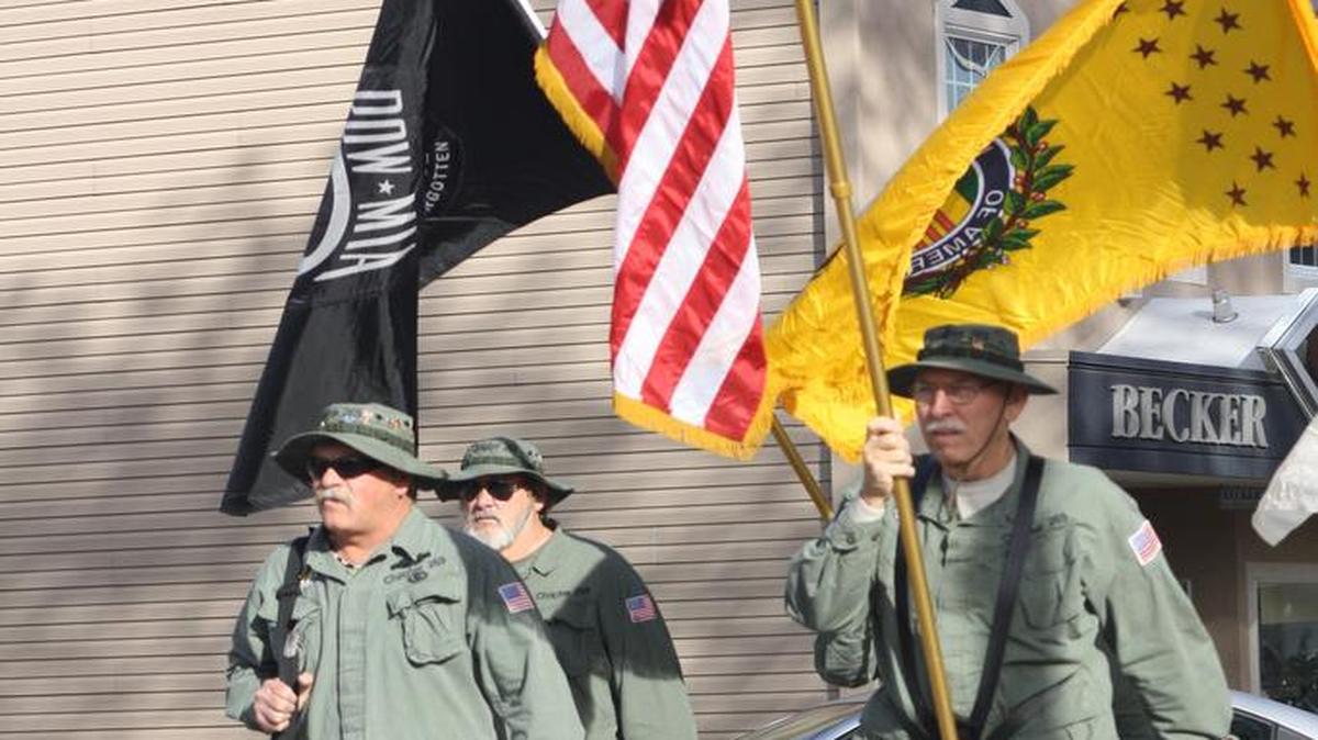 From left, Glenn Stoecklin of Pocahontas, Glen Weber of Pocahontas and Norbert Peters of New Baden march with the Vietnam Veterans Chapter 269 out of Clinton County in last year’s Veterans Day parade in Highland.