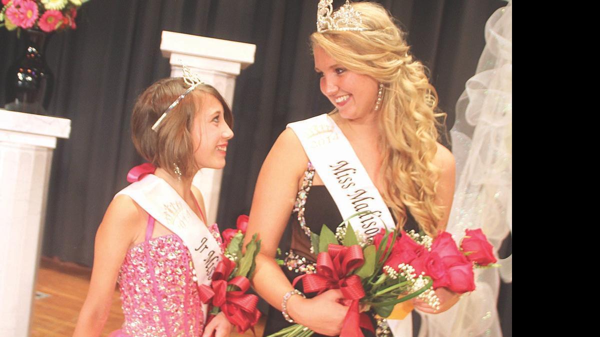 
2014 Madison County Junior Miss Kiris Kovarik, left, and 2014 Madison County Fair Queen Maddie Braesch walk off the stage at Highland Elementary School at last year’s Miss Madison County Fair Queen Pageant.
