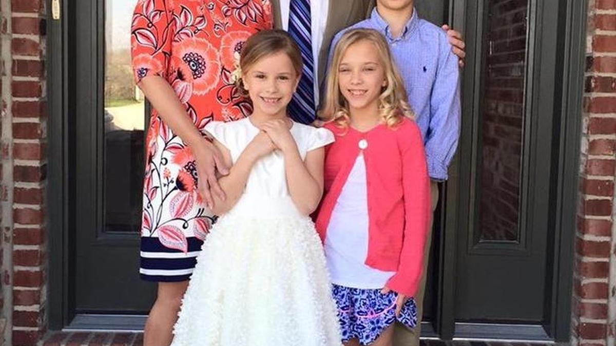 Carrollton Bank Regional Director Dan Jackson stands with his wife Julie and his three children (left to right) Lindsay, 7; Emily, 9; and, Luke, 11.