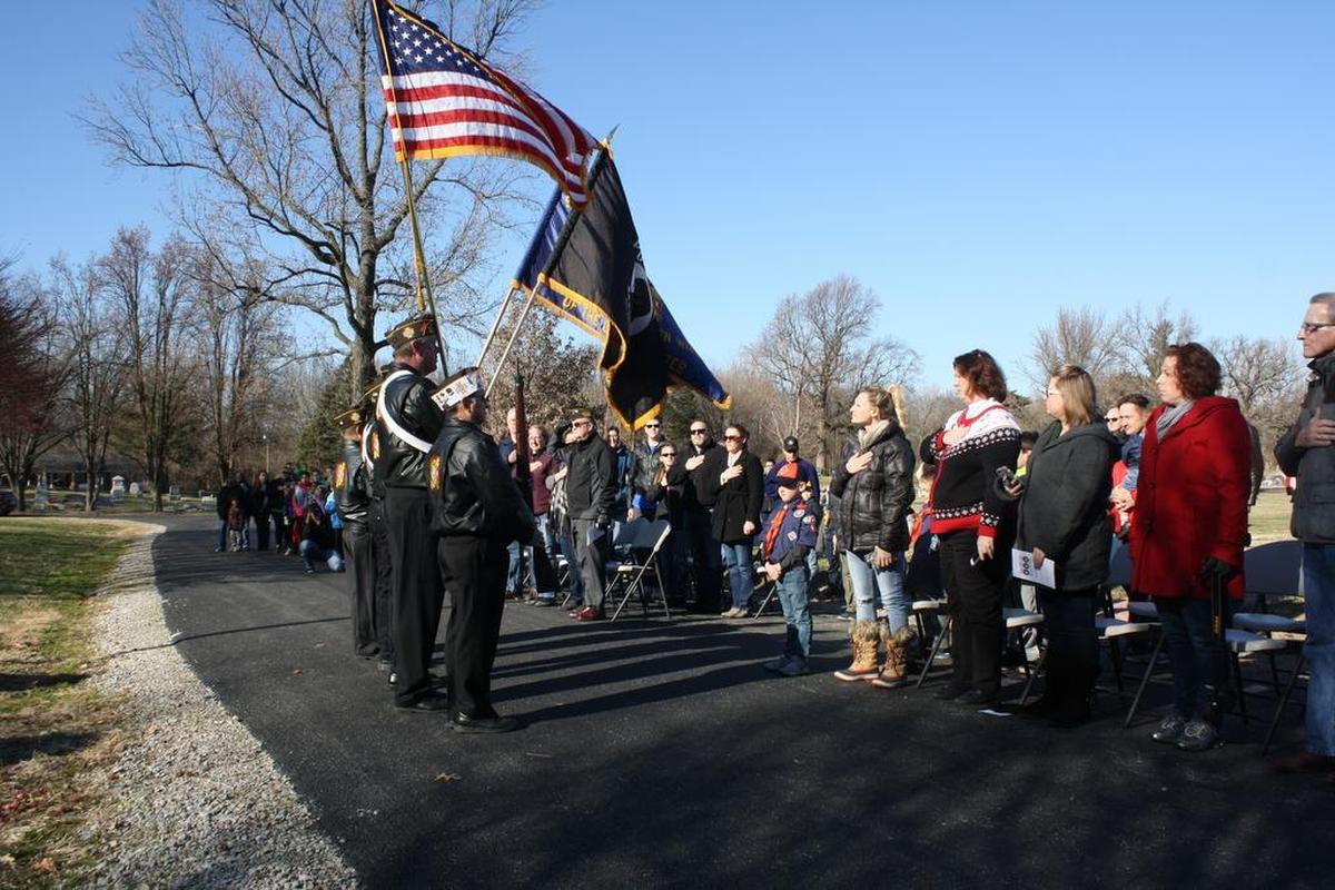 O’Fallon Post 805 Veterans of Foreign Wars members open the O’Fallon Cemetery Wreaths Across America ceremony Saturday, Dec. 16 with the posting of the colors.