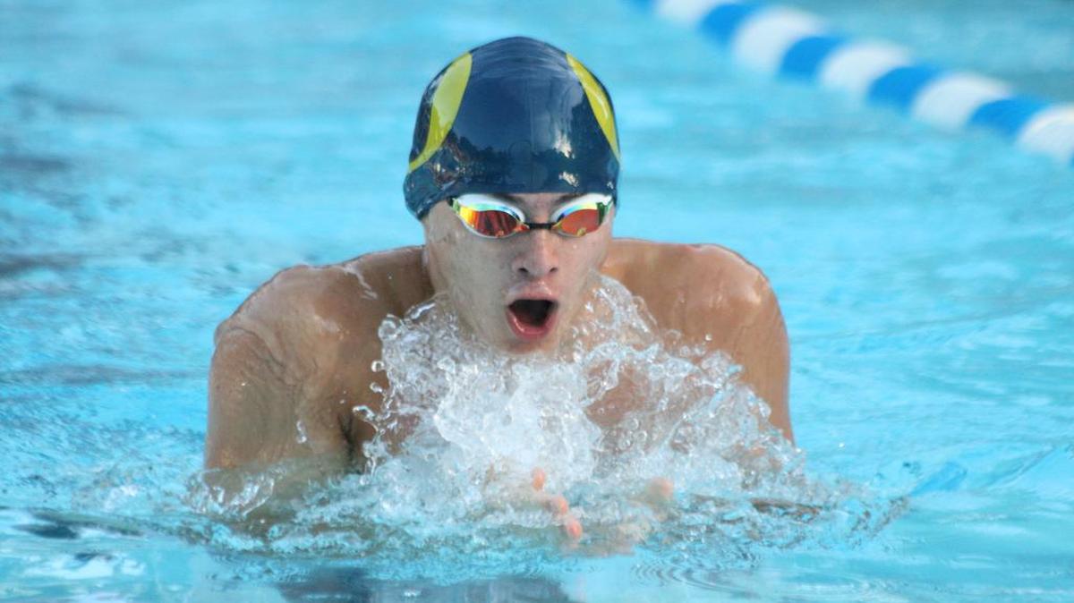 Jonathan Stein swims to a third-place finish in the 15-18 boys 100-meter breast against the Scott Sharks. The Breakers won the meet 413-117.