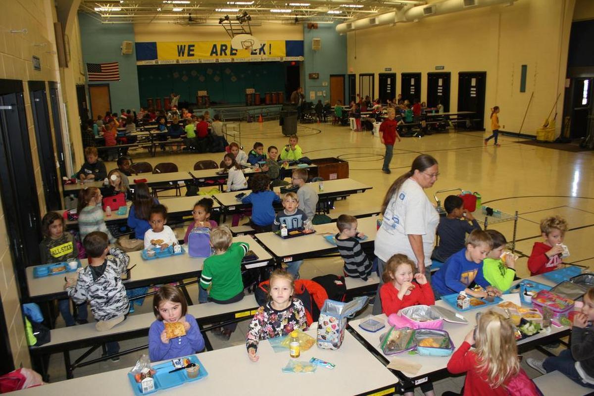 O’Fallon School District 90 Estelle Kampmeyer Elementary kindergarten and third grader students break from hitting the books to eat lunch.
