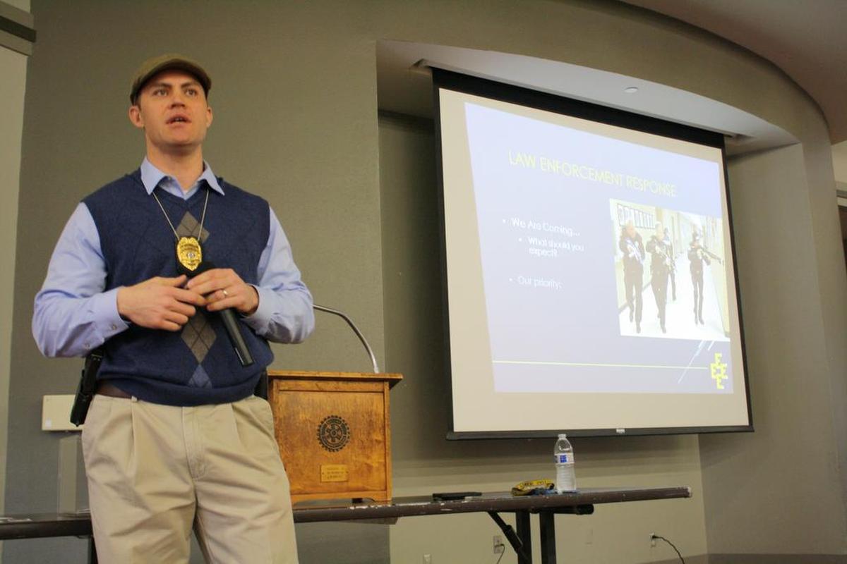 O’Fallon Police Sgt. Patrick Feldhake talks to 100 attendees of the O’Fallon-Shiloh Chamber of Commerce luncheon at the Katy Cavins Community Center Wednesday, Jan. 10, about law enforcement response and its role during an active killer event as a part of the OPD’s community education on the 4E’s: educate, escape, evade and engage.