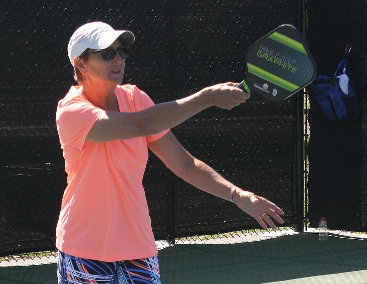 Diane Hanft, of Freeburg, serves the ball during a doubles match of pickleball at Hesse Park in 2017. Contracts are headed to the O’Fallon City Council for approval Monday, June 20, for the highly anticipated improvements to the pickleball courts at Hesse Park.